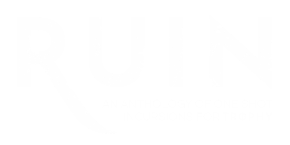 A hardcover book on a desk surrounded by gadgets (for playing Trophy online, probably!)